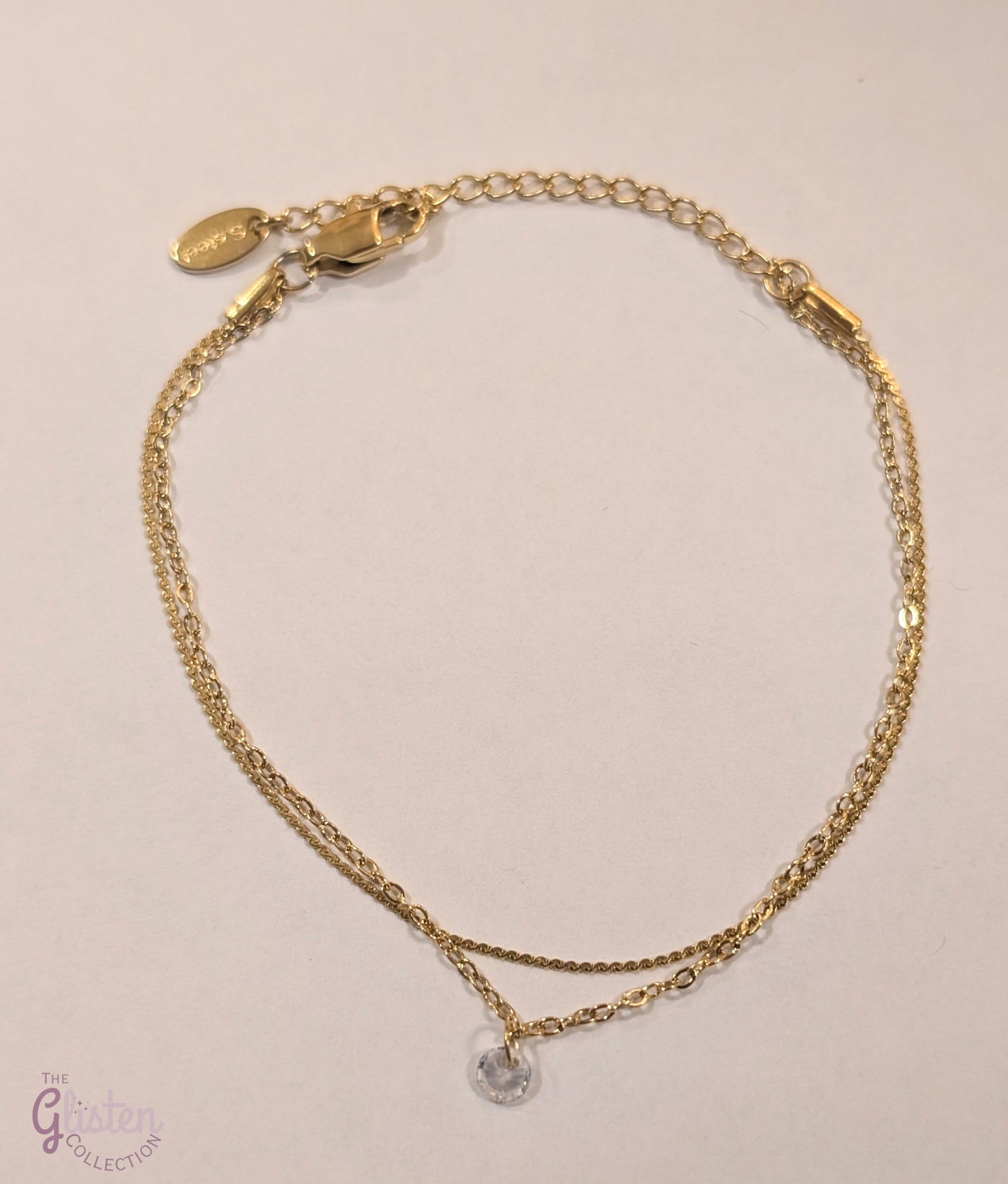 Delicate double-layer zircon bracelet with shimmering zircon stones, offering a light and elegant touch.