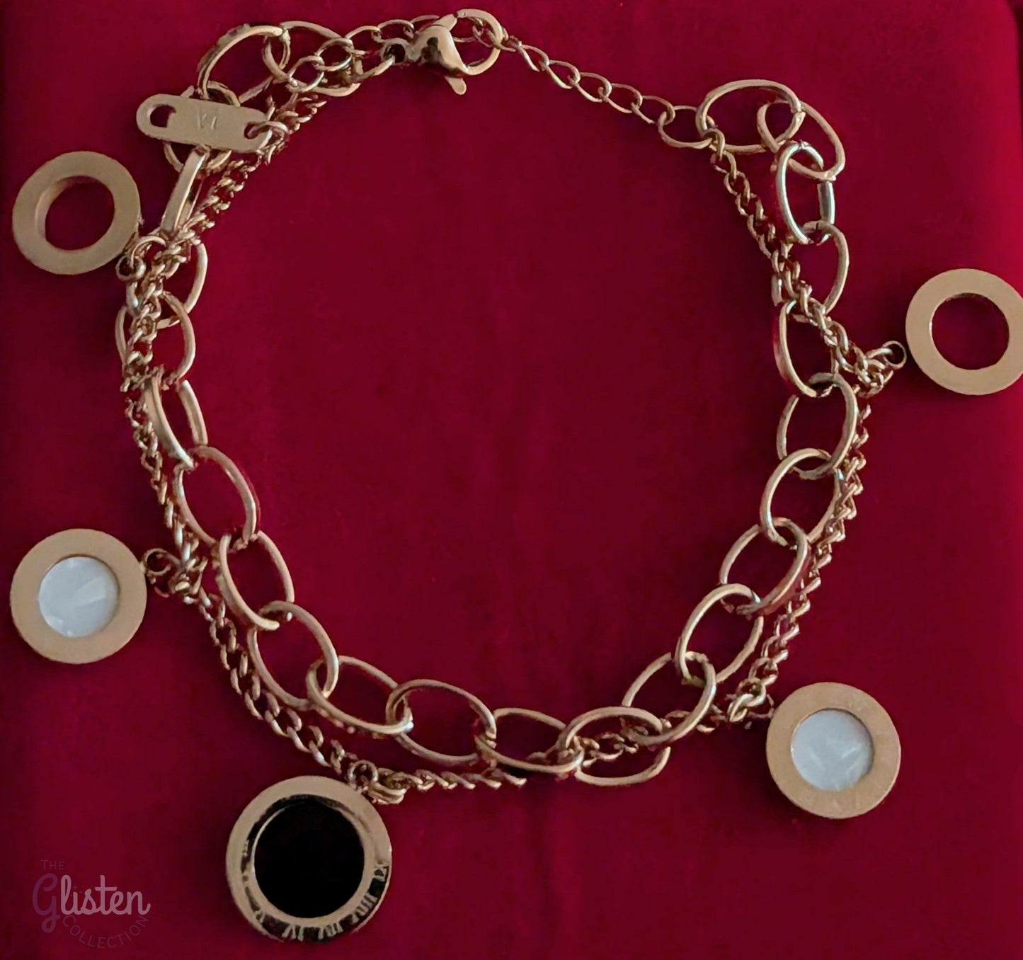 Roman-inspired double-layer titanium steel bracelet with 18K gold plating, adding a stylish and modern touch to any outfit.
