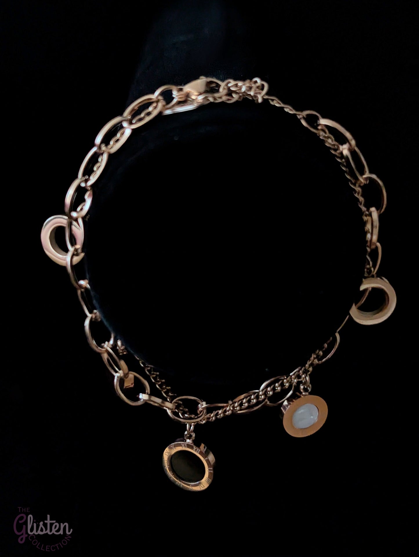 Roman-inspired double-layer titanium steel bracelet with 18K gold plating, adding a stylish and modern touch to any outfit.