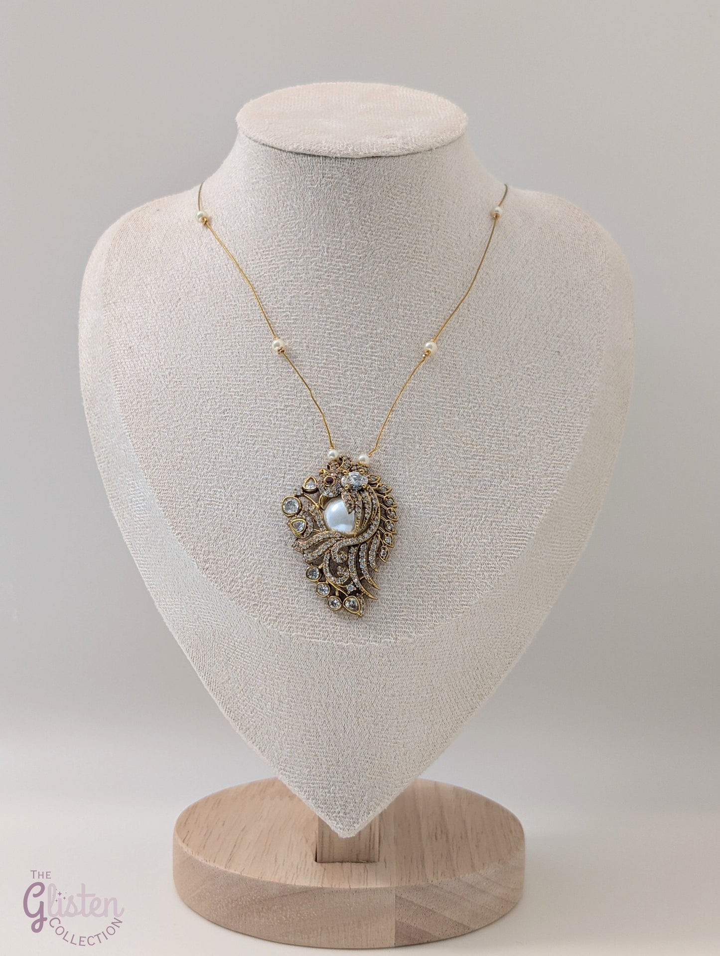 Pearl and CZ pendant on invisible chain — elegant floating necklace for special occasions and everyday sophistication.