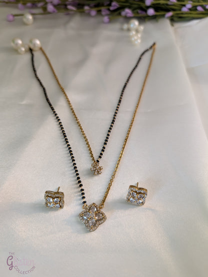 Layered black bead necklace set with Moissanite floral designs and simple matching earrings — perfect for daily wear and traditional occasions.