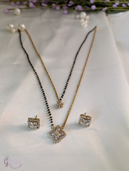 Layered black bead necklace set with Moissanite floral designs and simple matching earrings — perfect for daily wear and traditional occasions.
