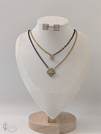 Layered black bead necklace set with Moissanite floral designs and simple matching earrings — perfect for daily wear and traditional occasions.