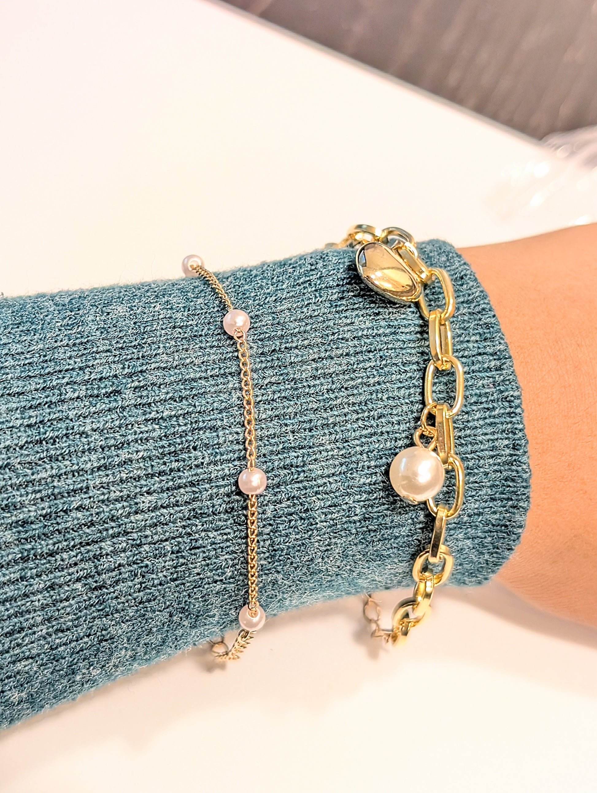 Set of two bracelets – one with heart charm and pearls, one with full artificial pearls, perfect for layering and daily wear.