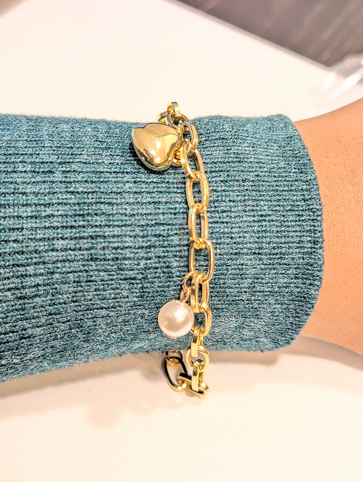 Set of two bracelets – one with heart charm and pearls, one with full artificial pearls, perfect for layering and daily wear.