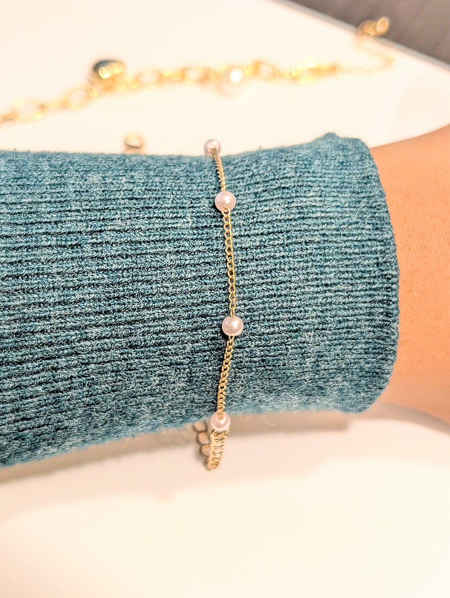 Set of two bracelets – one with heart charm and pearls, one with full artificial pearls, perfect for layering and daily wear.