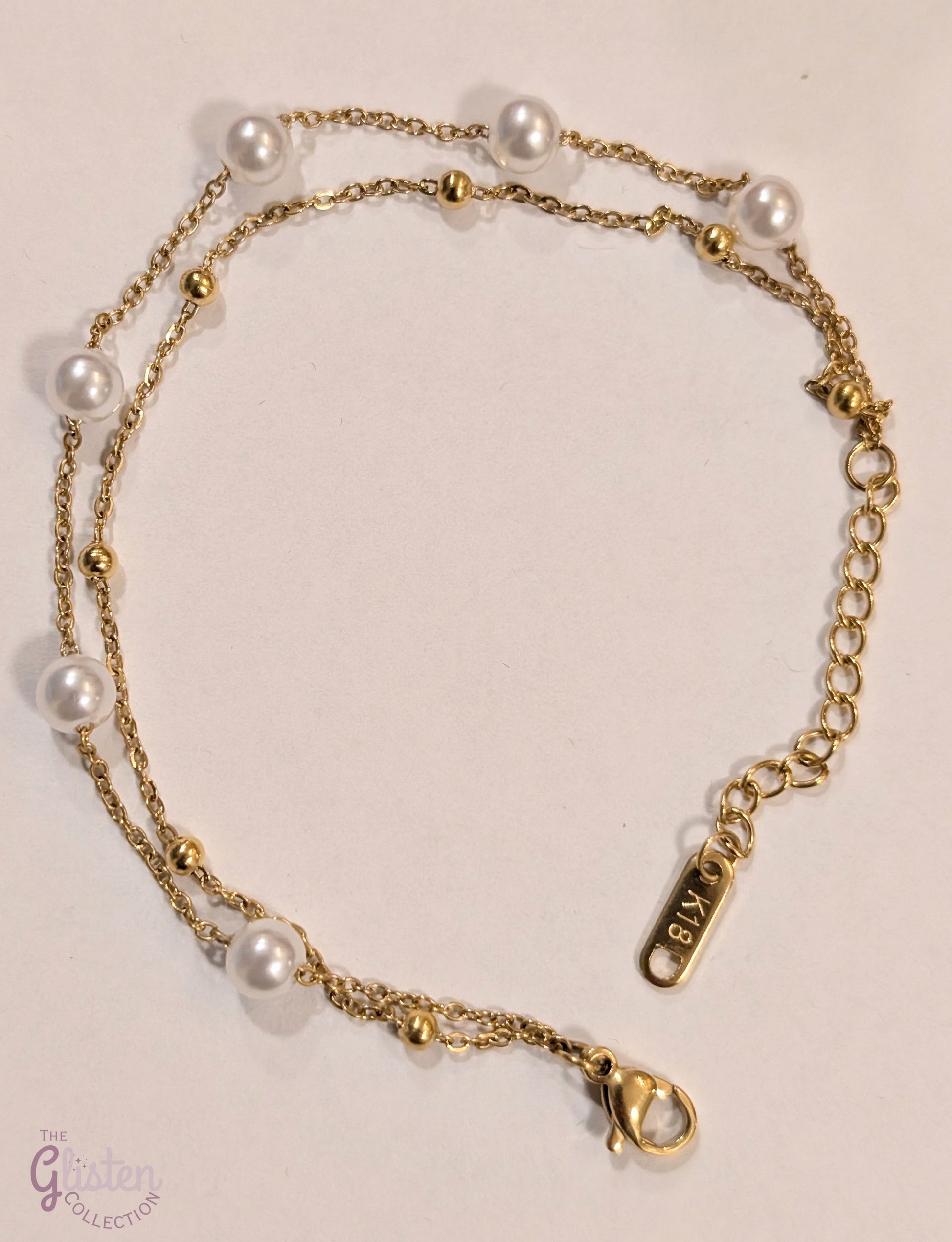 Solid color gold-plated titanium steel bracelet with a minimalist design.