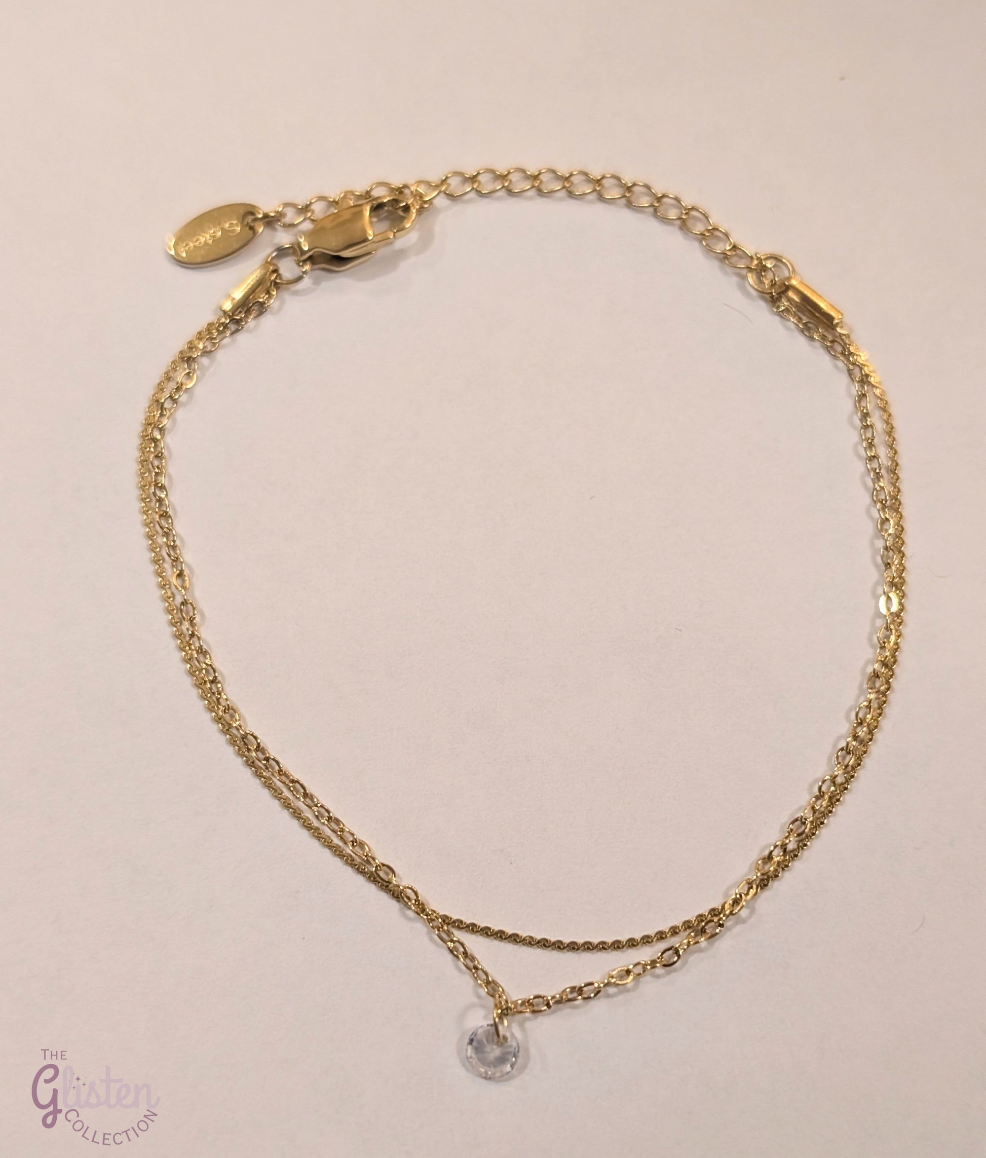 Delicate double-layer zircon bracelet with shimmering zircon stones, offering a light and elegant touch.