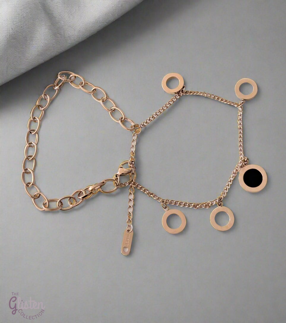 Roman-inspired double-layer titanium steel bracelet with 18K gold plating, adding a stylish and modern touch to any outfit.