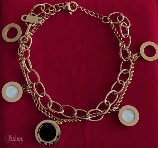 Roman-inspired double-layer titanium steel bracelet with 18K gold plating, adding a stylish and modern touch to any outfit.