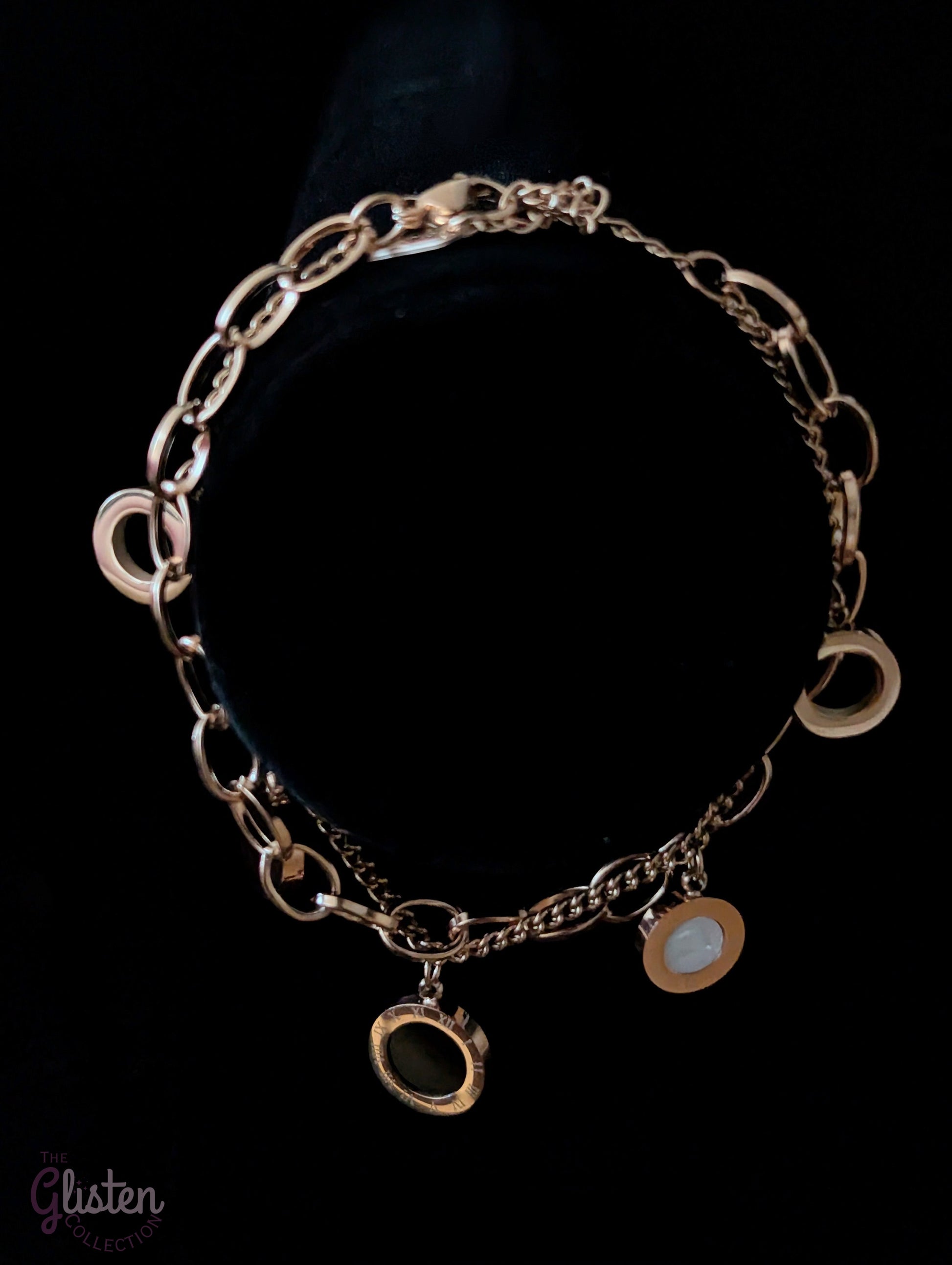 Roman-inspired double-layer titanium steel bracelet with 18K gold plating, adding a stylish and modern touch to any outfit.