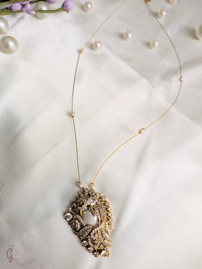 Pearl and CZ pendant on invisible chain — elegant floating necklace for special occasions and everyday sophistication.
