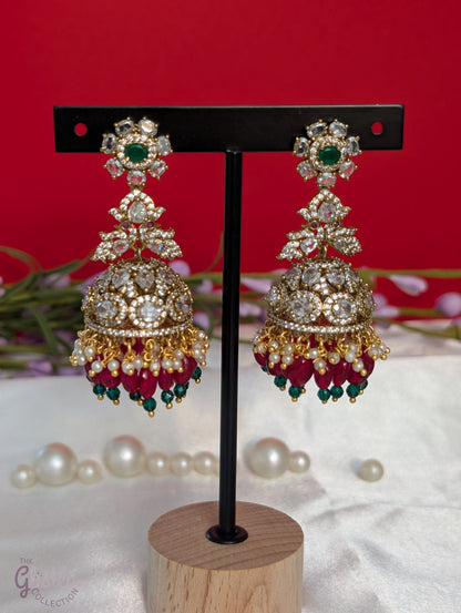Elegant Rainbow Dangle Jhumka earrings with white, red, and green beads, accented with green stone — ideal for Indian traditional attire and grand occasions.