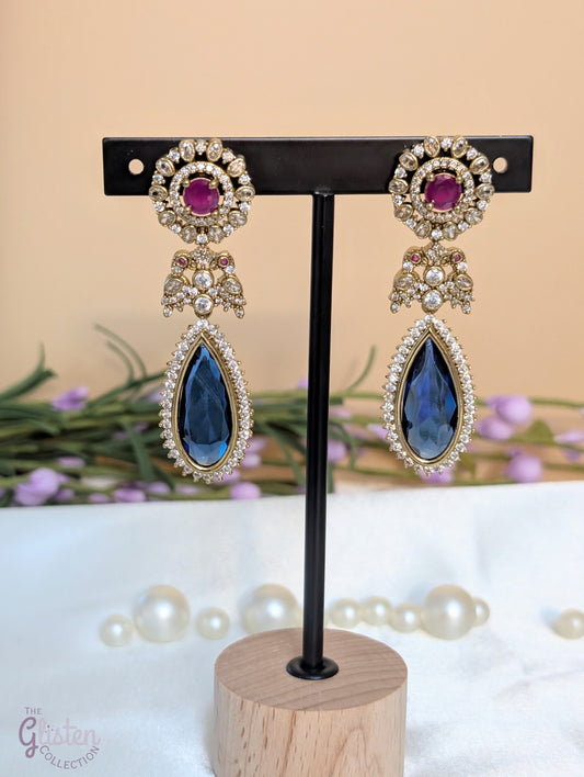 Blush & Blue Drop earrings with blue tear-drop stone, pink round stone, and CZ detailing — elegant for cocktail parties and celebrations.