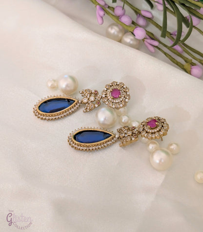Blush & Blue Drop earrings with blue tear-drop stone, pink round stone, and CZ detailing — elegant for cocktail parties and celebrations.