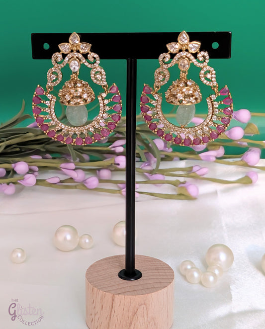 Blush Moon Chandbalis with dome-shaped top, crescent design, and vibrant pink stones — perfect for adding elegance to special occasions.