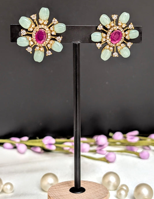 Floral Bloom Studs featuring pink, light green, and clear stones in a delicate floral design — perfect for adding elegance to any occasion.