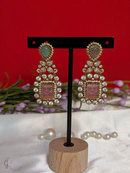 Rose Dew Drops earrings with pink square base, green tear-drop top, and Moissanite stones — ideal for modern or traditional occasions.