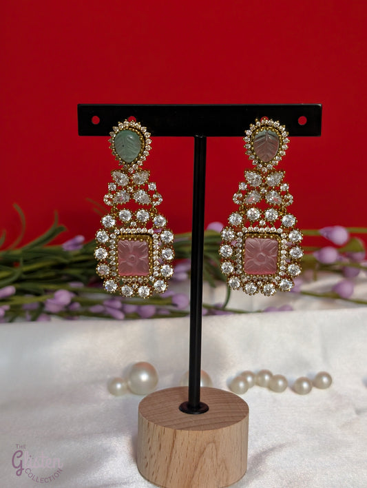 Rose Dew Drops earrings with pink square base, green tear-drop top, and Moissanite stones — ideal for modern or traditional occasions.