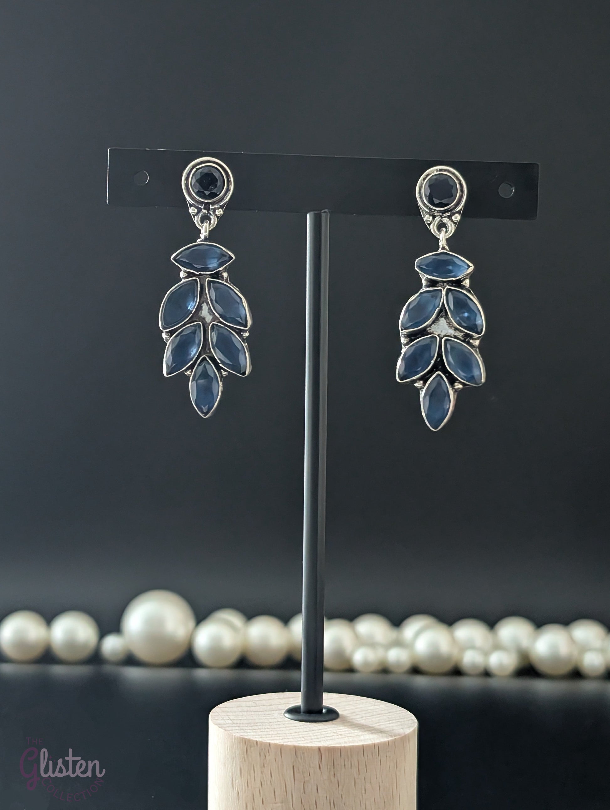 Oxidized leaf drop earrings with natural stones and secure push-back closure, perfect for nature-inspired elegance.
