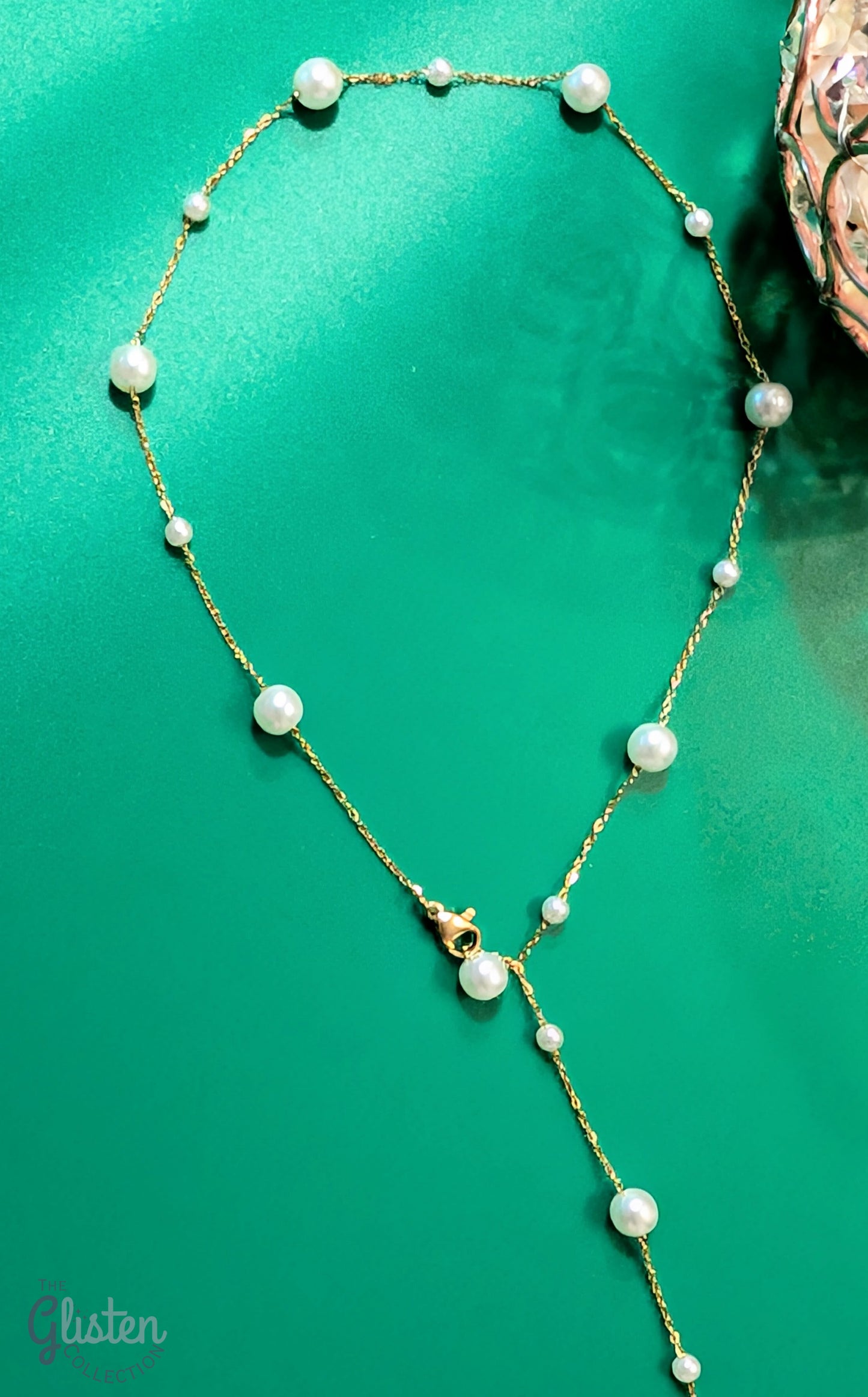 Elegant geometric tassel necklace made of titanium steel with artificial pearls, perfect for adding sophistication to any look.