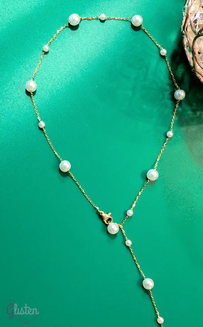 Elegant geometric tassel necklace made of titanium steel with artificial pearls, perfect for adding sophistication to any look.