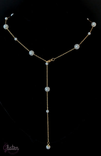 Elegant geometric tassel necklace made of titanium steel with artificial pearls, perfect for adding sophistication to any look.