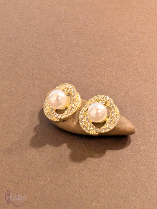 Titanium steel gold-plated stud earrings with artificial pearls and zircon accents, perfect for office wear and daily elegance.