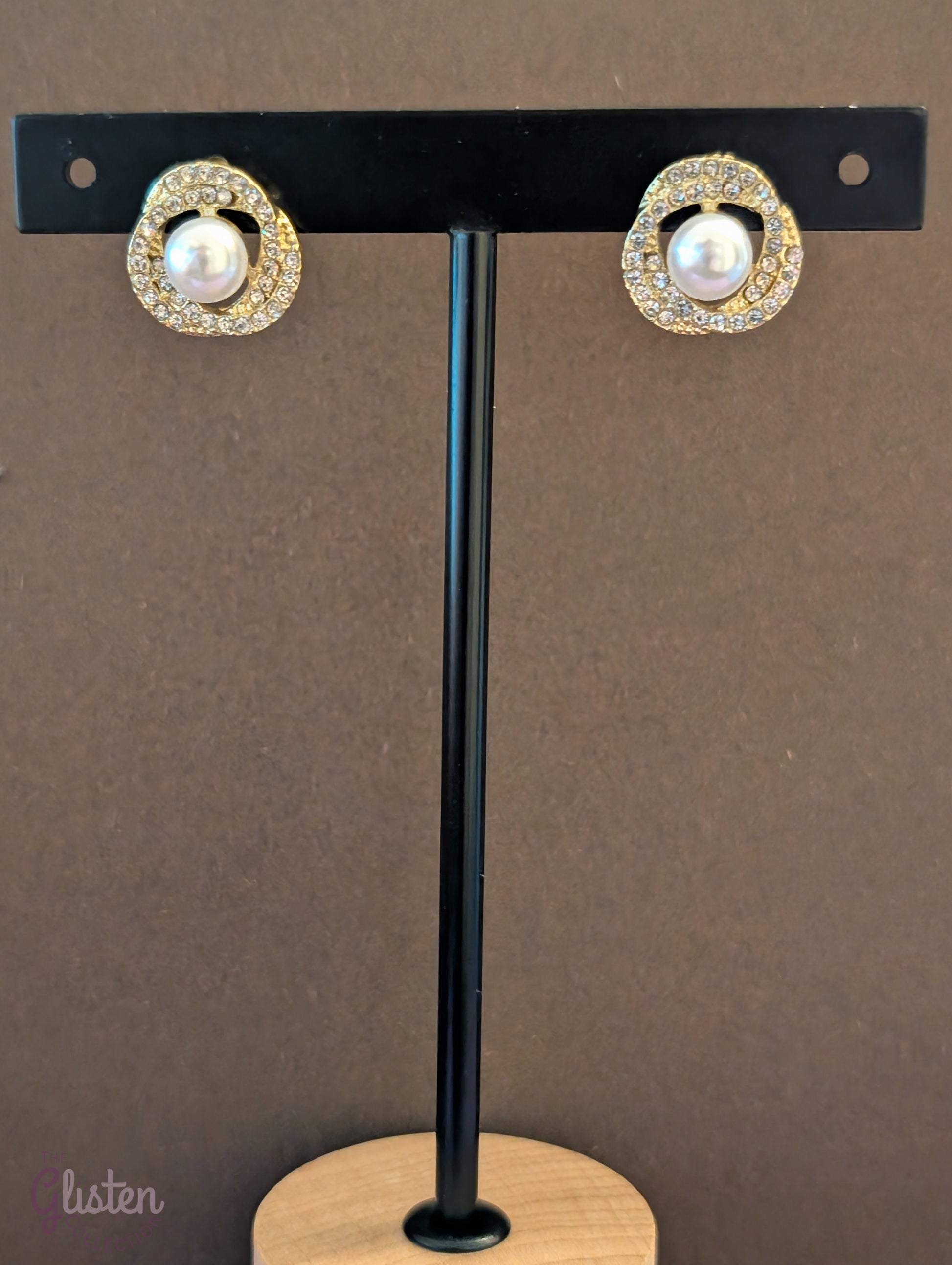 Titanium steel gold-plated stud earrings with artificial pearls and zircon accents, perfect for office wear and daily elegance.