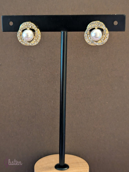 Titanium steel gold-plated stud earrings with artificial pearls and zircon accents, perfect for office wear and daily elegance.