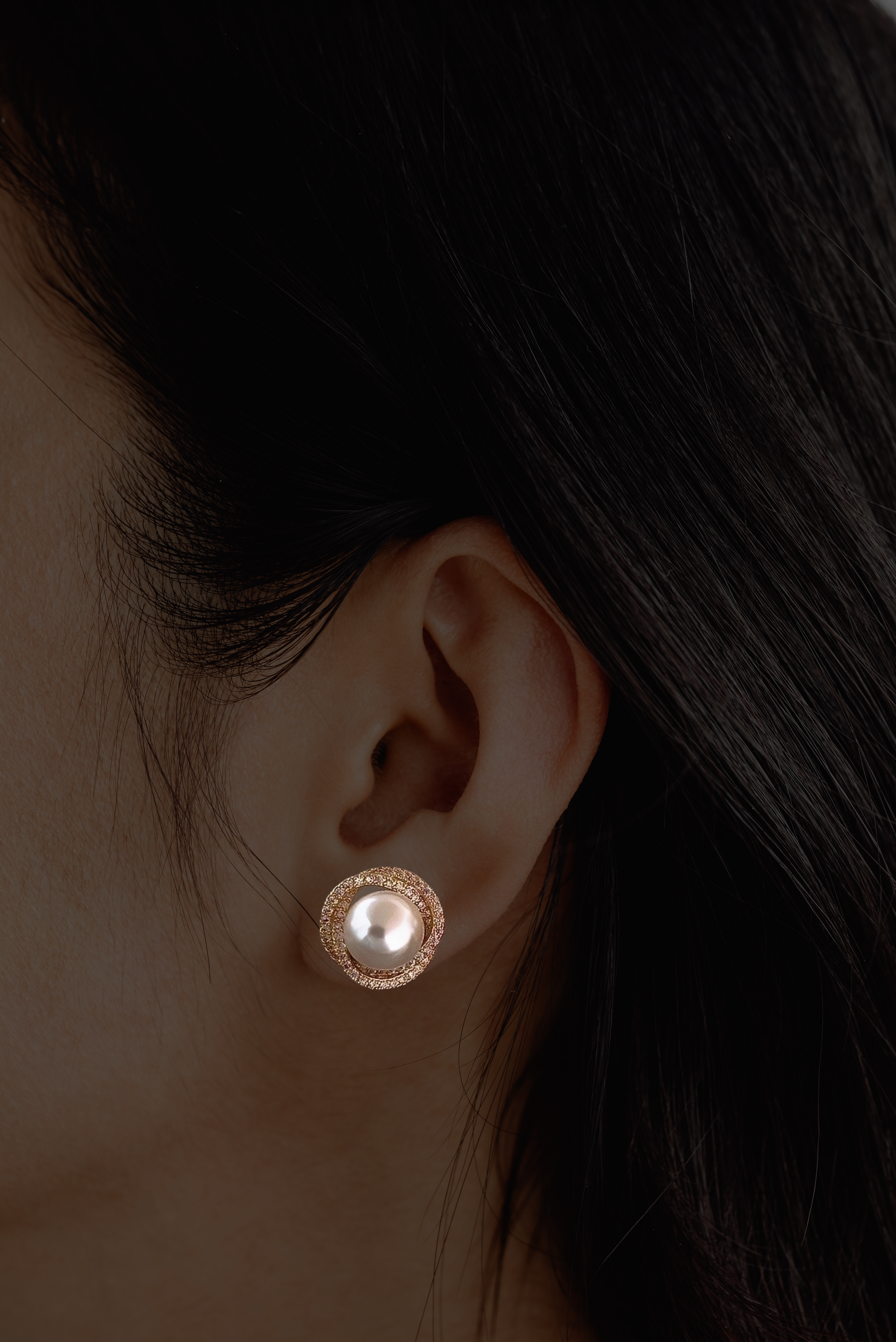 Titanium steel gold-plated stud earrings with artificial pearls and zircon accents, perfect for office wear and daily elegance.