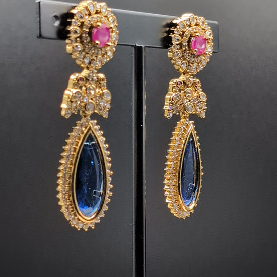 Blush & Blue Drop earrings with blue tear-drop stone, pink round stone, and CZ detailing — elegant for cocktail parties and celebrations.