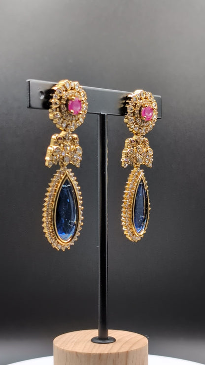 Blush & Blue Drop earrings with blue tear-drop stone, pink round stone, and CZ detailing — elegant for cocktail parties and celebrations.