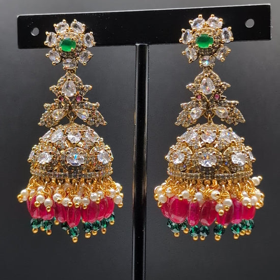 Elegant Rainbow Dangle Jhumka earrings with white, red, and green beads, accented with green stone — ideal for Indian traditional attire and grand occasions.