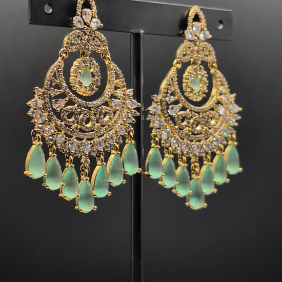 Mint Glow Chandbalis with light green stones, tear-drop dangles, CZ detailing, and classic gold-tone setting — must-have, best-selling earrings for any occasion, popular and loved by many.