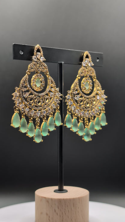 Mint Glow Chandbalis with light green stones, tear-drop dangles, CZ detailing, and classic gold-tone setting — must-have, best-selling earrings for any occasion, popular and loved by many.
