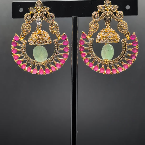 Blush Moon Chandbalis with dome-shaped top, crescent design, and vibrant pink stones — perfect for adding elegance to special occasions.