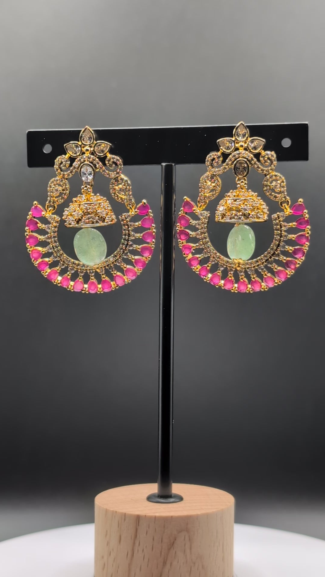 Blush Moon Chandbalis with dome-shaped top, crescent design, and vibrant pink stones — perfect for adding elegance to special occasions.