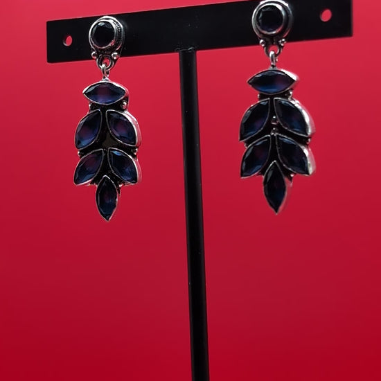 Oxidized leaf drop earrings with natural stones and secure push-back closure, perfect for nature-inspired elegance.